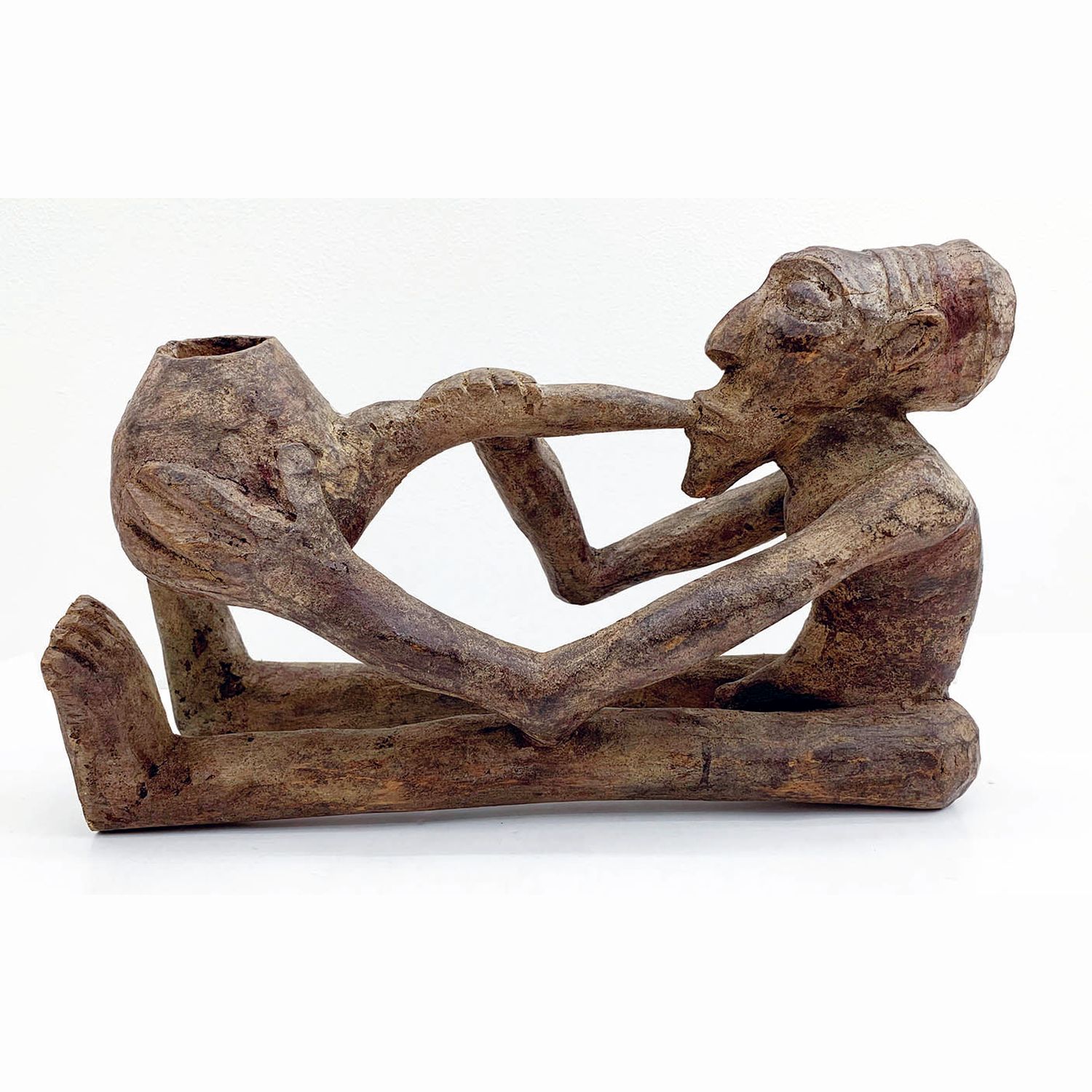 パイプを吹く人